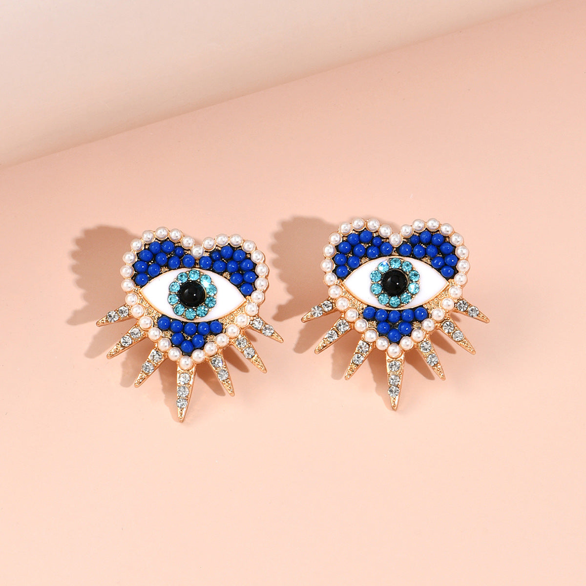 Blue Heart Eye Earrings